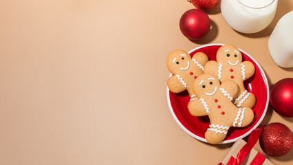 Festive holiday gingerbread cookies with milk for Christmas celebration. Happy New Year. Copy space