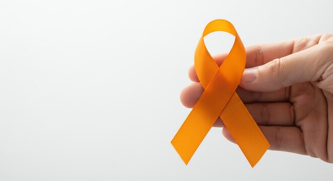 Orange ribbon held in hand