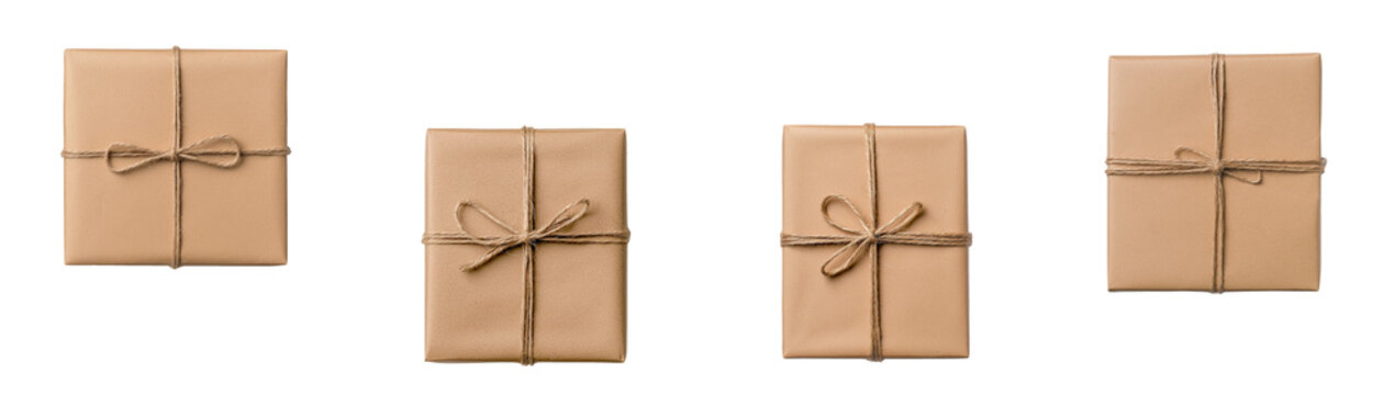 Four neatly wrapped brown paper packages tied with string evoke sense of anticipation and simplicity