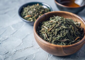 Fototapeta premium green tea leaves on white background