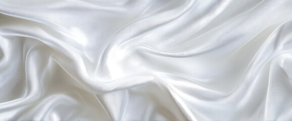 Fototapeta premium Soft, flowing white silk fabric, rippled and draped