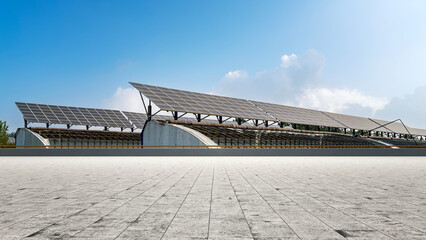 Modern building with solar panels under clear blue sky