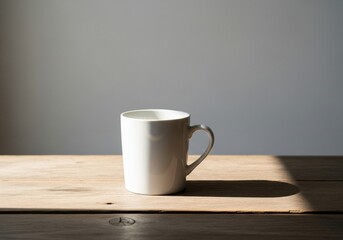 Fototapeta premium White Ceramic Mug on Wooden Table in Natural Light
