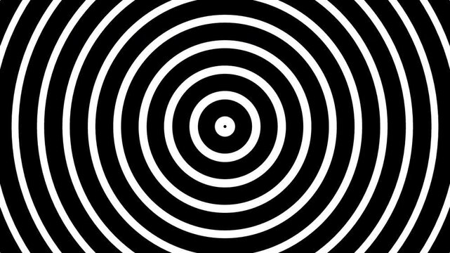 Hypnotic black and white spiral pattern, mesmerizing and intriguing design suitable for hypnotist posters or abstract backgrounds.