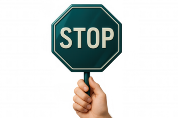 Hand gripping red octagonal stop sign, conveying traffic safety warning against clear background, symbolizing regulatory control