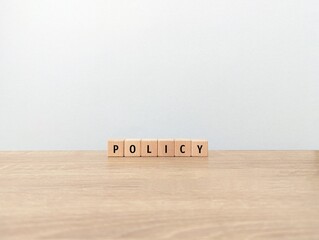 Policy spelled out in wooden blocks