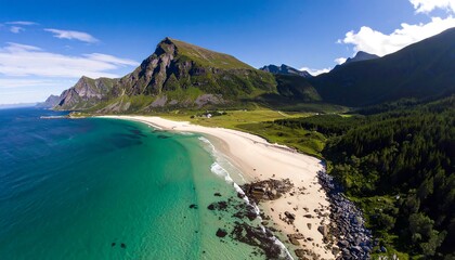 Panoramic view of a pristine beach, mountains, and ocean