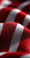 Close-up of red and white striped fabric, textured surface