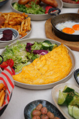 Delicious breakfast spread featuring omelette and sides