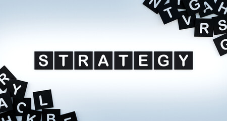 Strategy, word with tokens. MEthod, planning, advice, gol, plan, approach, tactics, business strategy. 3D illustration © Westlight