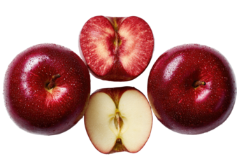 Deep red apples, whole and halved, arranged symmetrically on a black background