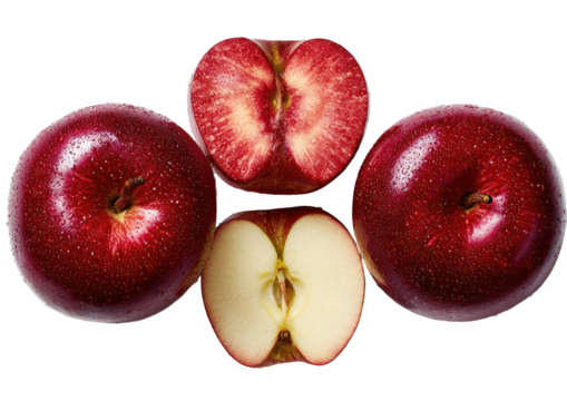 Deep red apples, whole and halved, arranged symmetrically on a black background