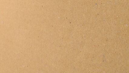 Background of brown kraft paper or cardboard texture, crumpled paper texture as a beige background