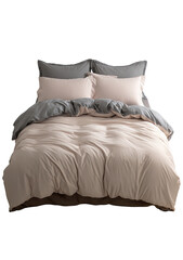 A blush-toned bed set, featuring a soft duvet cover and matching pillows, in a muted color palette