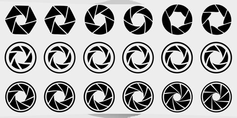 Collection of black camera aperture blades and diaphragm symbols on a light gray background