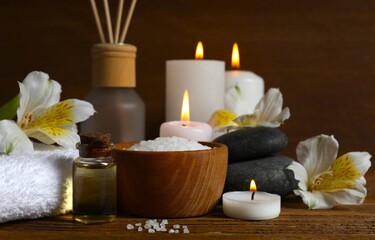 Herbal therapy, traditional medicine and homeopathy concept. Bath salt, candles and bottle natural organic oil essence serum. Set for spa, massage and aromatherapy 