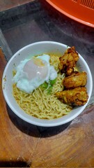 Delicious Indomie kuah with rich, savory broth and springy noodles, creating a warm and comforting meal. Perfect for a quick, satisfying dish with bold flavors and aromatic spices!