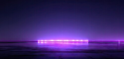 A dark, purple-toned  space with a horizontal row of glowing pink lights reflected on a smooth surface.