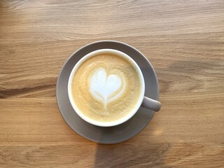 Cup of cappuccino on the table, close up