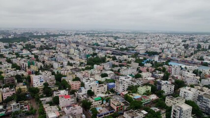 Nagole cityscape with flyover and sky. day time, push in, drone shot, 4k.