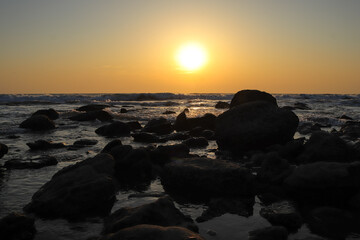 Sunset Glow Over the Waves at Inani Beach, Cox's Bazar, Bangladesh