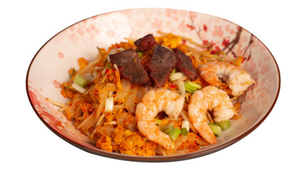 Stir fried kwetiau with shrimp and lapchiong. Served on brown stone plate. Transparant picture. Stir fried kwetiau with shrimp and lapchiong. Served on brown stone plate. Isolated from blac