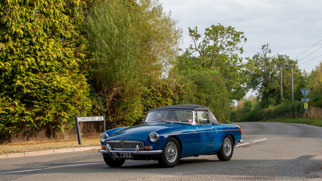 Whittlebury,Norhants,UK - Aug 23rd 2025: 1971 MG B classic  British sports car driving on a British road