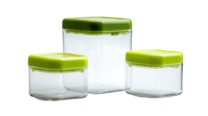 Three clear glass food storage containers, stacked. Each container has a square shape and a lime green lid