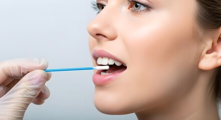 Obraz premium Medical Professional Taking a DNA Sample with an Oral Swab 