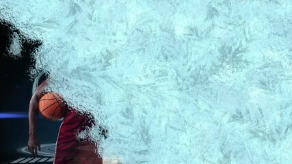 Ice freezing overlay against african american male basketball player and data processing - Powered by Adobe