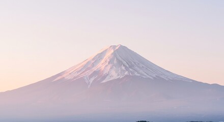 Serene sunrise gently illuminates snowcapped mountain peak. AI Generated