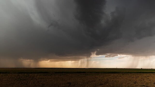 Supercell Thunderstorm with Lightning Evolving over a Colorado Field Timelapse