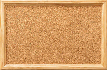 Fototapeta premium A light beige cork bulletin board in a light brown wooden frame