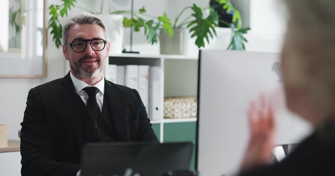 Discussion, interview and hr with business people in office for recruitment advisor, meeting and hiring. Talent acquisition specialist, human resources and candidate assessment with mature employees