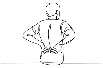 Person experiencing lower back pain with hands on hips