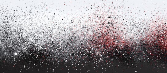 Obraz premium A dynamic spray paint design showcases a gradient of black, gray, white, and red splatters, creating a striking abstract pattern.