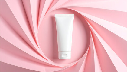 Top view of a generic white cosmetic tube on a creative pink paper spiral, perfect for skincare or beauty product mockups