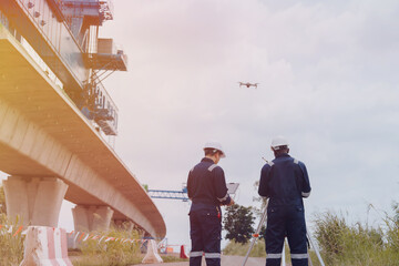 Surveying engineers use cameras and drones to survey road and high-speed railway construction sites or conduct safety inspections.