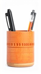 Two pens in a small, orange bamboo pen holder with a carved design around the middle, against a plain white background