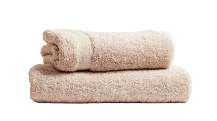 Two light beige towels stacked, one rolled atop the other