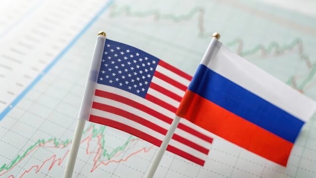 US and Russia flags overlaid on financial graph — visualizing economic comparison and data trends