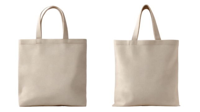 Two identical blank beige canvas tote bags, side-by-side, isolated on a black background