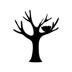 Silhouette of a bare tree with bird's nest in its branches in black