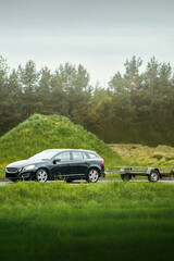Outdoor road transport with covered trailer