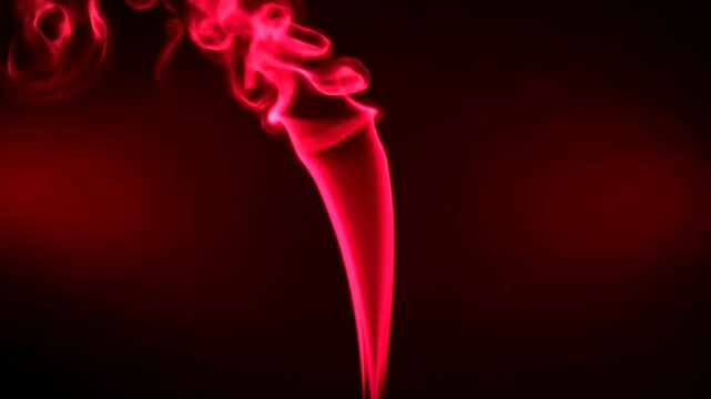Intricate red smoke patterns against a deep black and crimson background.