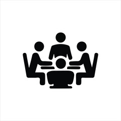 Four people in a meeting around a table with a central figure business discussion