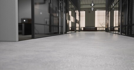 Naklejka premium Sunlight streams through large windows in a modern corridor featuring sleek lines and a minimalist aesthetic. The smooth floor reflects light, creating a serene atmosphere.