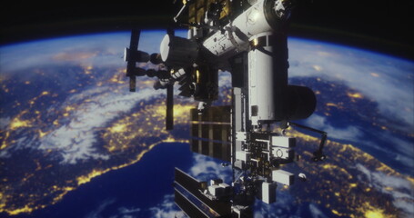 The International Space Station orbits Earth, illuminated by city lights during nighttime. The curve of the planet and visible continents create a stunning view from space.