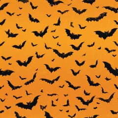Fototapeta premium Pattern of black bats on an orange background.