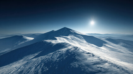 Majestic snow covered mountains rise under clear blue sky, illuminated by bright sun. serene landscape evokes sense of tranquility and awe, showcasing nature beauty